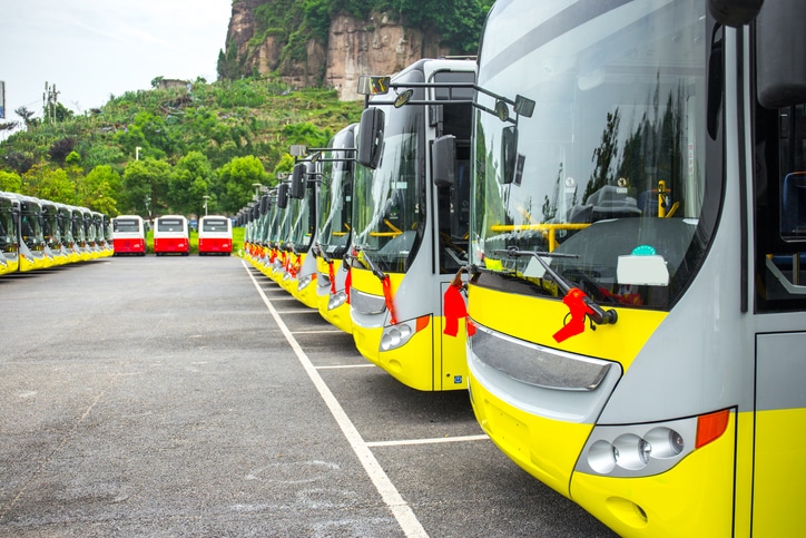 A large number of parked electric buses