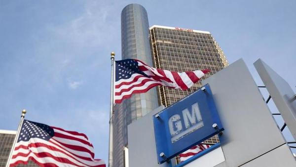 GM headquarters with american flags