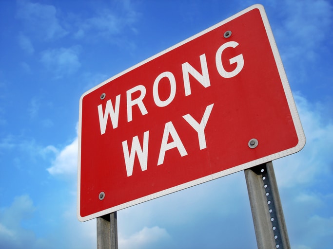 wrong-way red driving sign