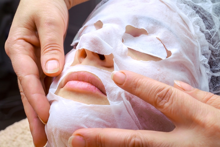 skin care face mask on woman