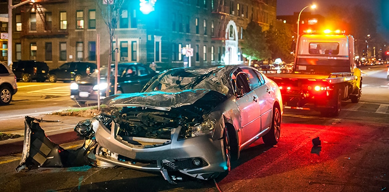 car and tow truck after serious accident
