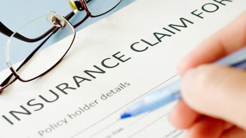 Filling out insurance claim form