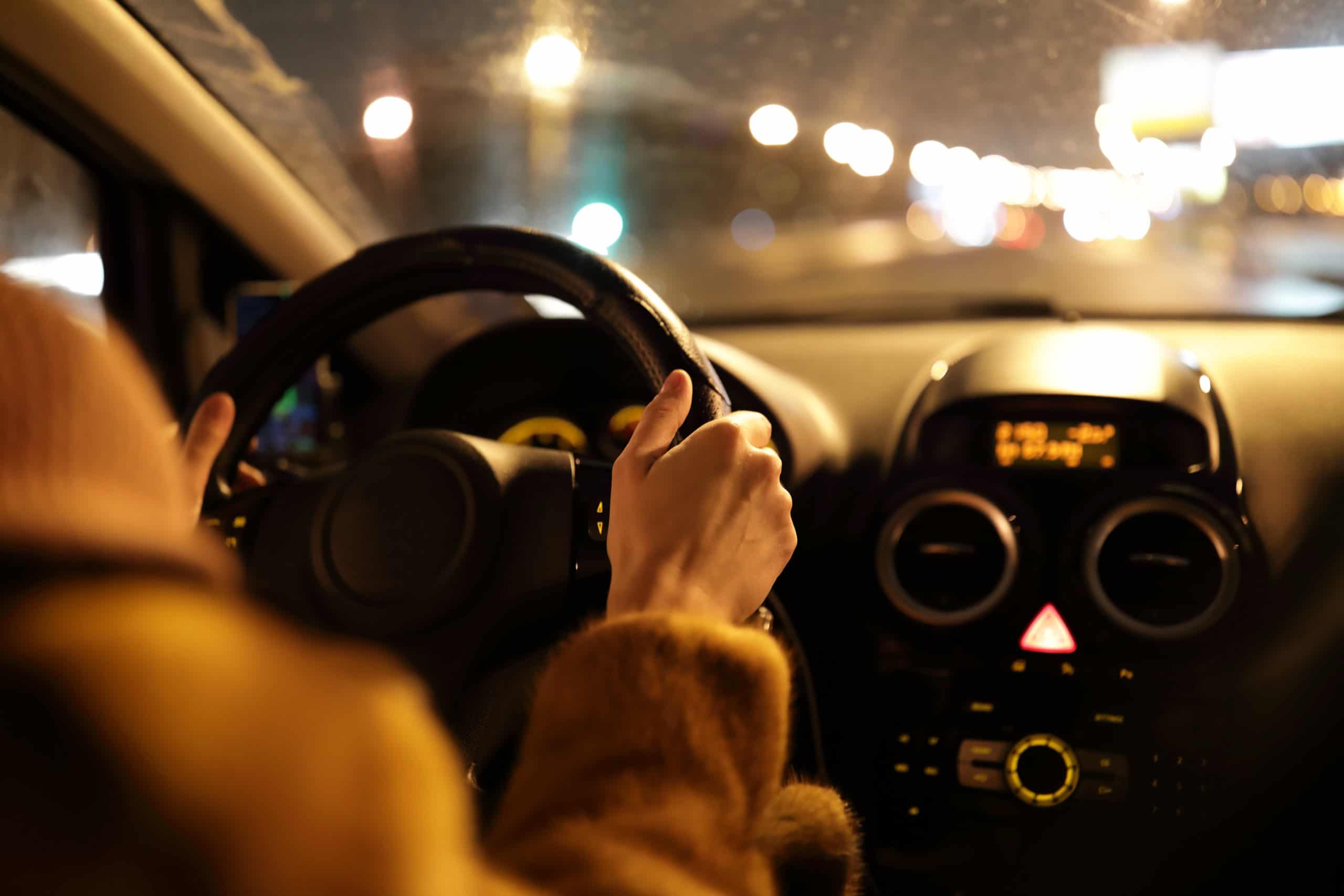 Person driving at night